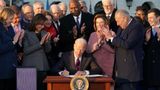 Biden signs Inflation Reduction Act, notching policy win ahead of midterms