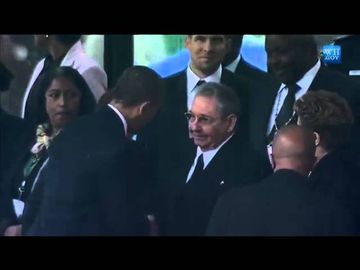 Obama shakes the hand of Raul Castro during Nelson Mandela funeral