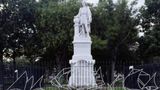 Box covering Columbus statue in Philadelphia painted with Italian flag colors