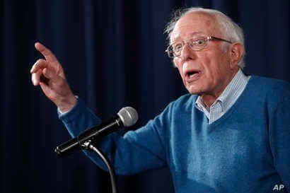 Democratic presidential candidate Sen. Bernie Sanders, I-Vt., gestures while speaking during a news conference at his New…