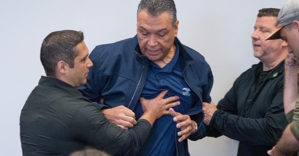 Footage shows Padilla pushing law enforcement officers as he's removed from briefing