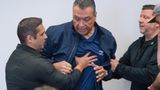 Footage shows Padilla pushing law enforcement officers as he's removed from briefing