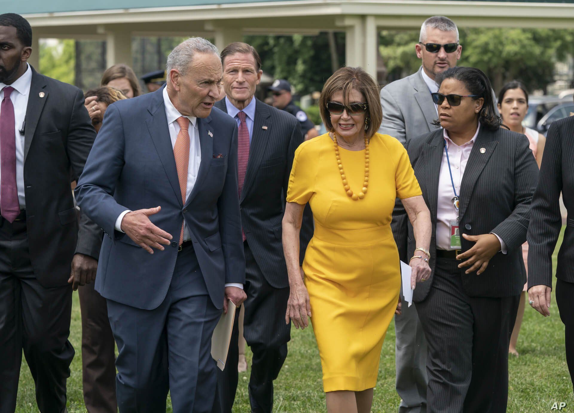 FILE - Senate Minority Leader Chuck Schumer, D-N.Y., left, and Speaker of the House Nancy Pelosi, D-Calif., walk together at the Capitol in Washington, June 20, 2019.