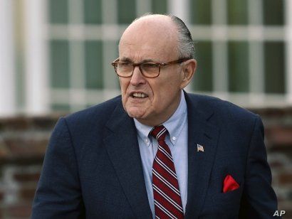 FILE - Former New York Mayor Rudy Giuliani arrives at the Trump National Golf Club Bedminster clubhouse in Bedminster, N.J., Nov. 20, 2016, President Donald Trump's new lawyer Rudy Giuliani said Wednesday the president repaid attorney Michael Cohen 