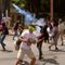 Rocks, Tear Gas Exchanged as Honduran Protesters Face Off With Riot Police
