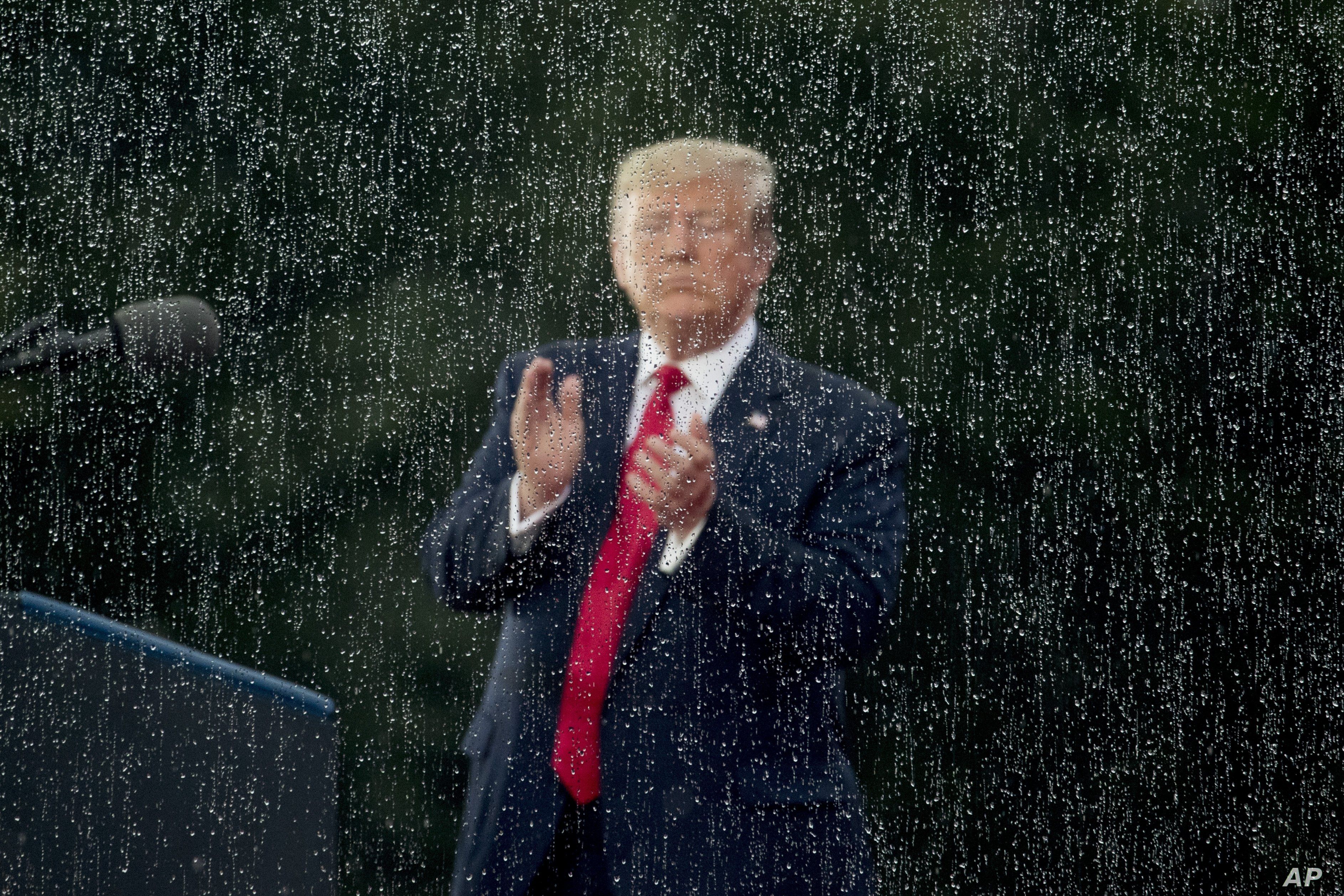 President Donald Trump applauds during an Independence Day celebration in front of the Lincoln Memorial, July 4, 2019, in Washington.