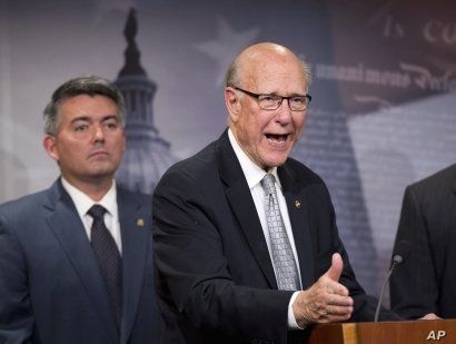Sen. Pat Roberts (r) with Sen. Cory Gardner speaks about the Guantanamo Bay Detention Facility, Nov. 5, 2015, during a news conference on Capitol Hill in Washington. 