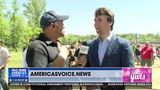 Charlie Kirk talks with Ben Bergquam at the MAGAFRANK rally
