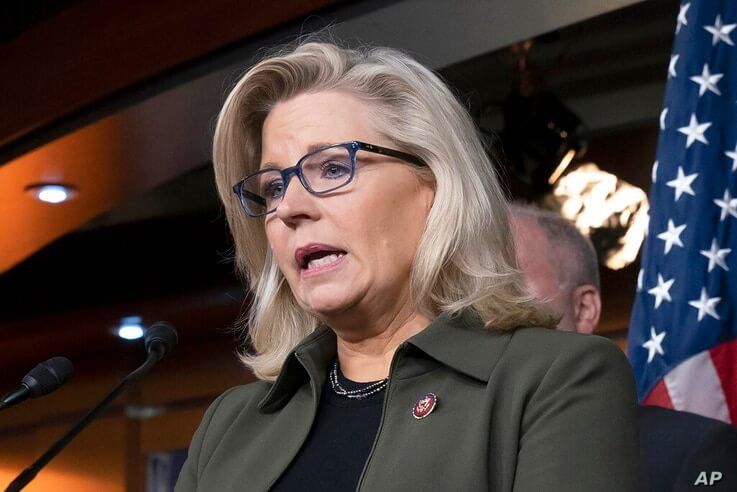 FILE - In this Dec. 17, 2019 file photo, Rep. Liz Cheney, R-Wyo., speaks with reporters at the Capitol in Washington. Cheney…