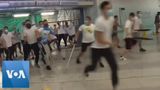 Attackers beat people on Hong Kong subway
