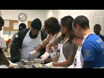 Obama honors MLK holiday, visits soup kitchen