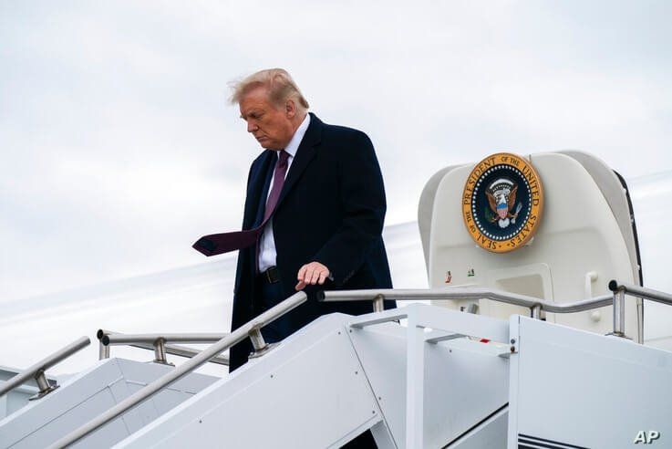 President Donald Trump arrives at Morristown Municipal Airport to attend a fundraiser at Trump National Golf Club in Bedminster…