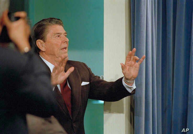 U.S. President Ronald Reagan tells reporters that 