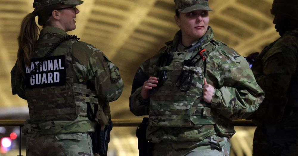 Suspect in capital murder case in shooting of National Guard troops pleads not guilty