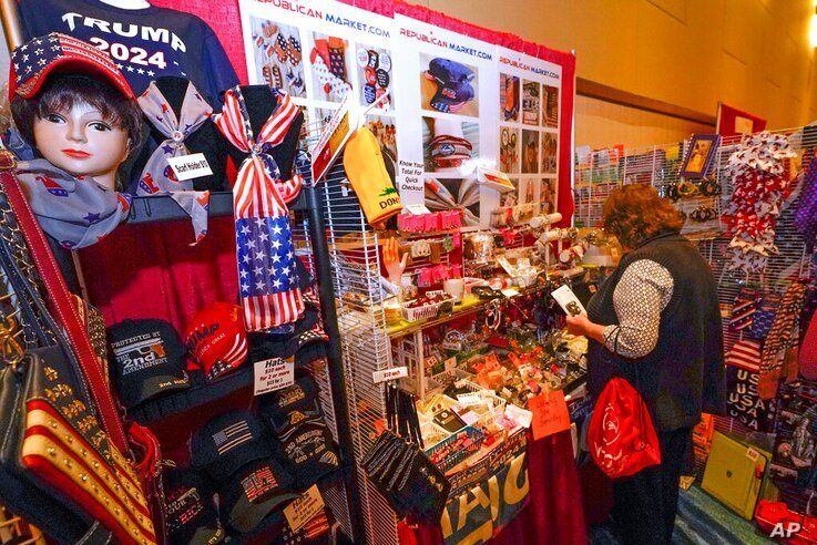 Conservative shirts, hats, ties and other items are displayed for sale at the merchandise show at the Conservative Political…