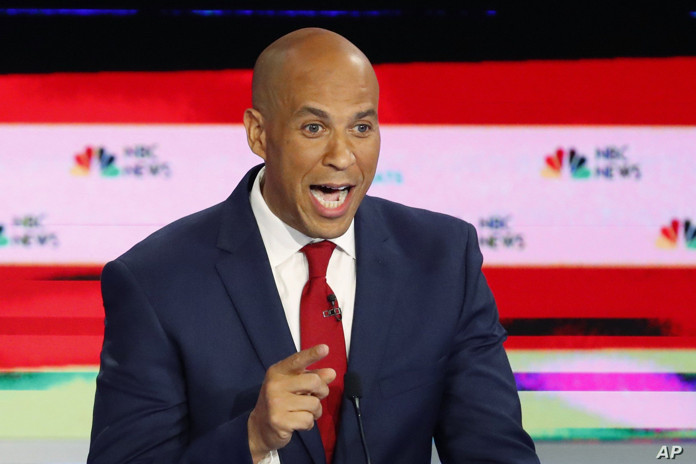 In this June 26, 2019 photo, Democratic presidential candidate Sen. Cory Booker, D-N.J., speaks during a Democratic primary debate hosted by NBC News at the Adrienne Arsht Center for the Performing Art, in Miami.  (AP Photo/Wilfredo Lee)