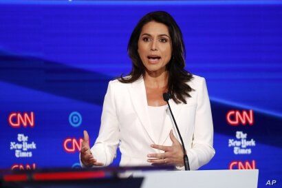 Democratic presidential candidate Rep. Tulsi Gabbard, D-Hawaii, participates in a Democratic presidential primary debate  at Otterbein University, Oct. 15, 2019, in Westerville, Ohio. 