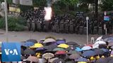 Tear Gas Fired as Hong Kong Activists Defy Protest Ban