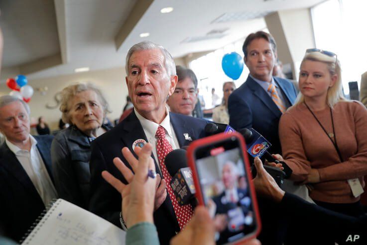 Louisiana's Republican gubernatorial candidate Eddie Rispone talks to media on a campaign stop at New Orleans International Airport in Kenner, La., Nov. 4, 2019.