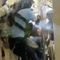 Police Officer Draws Gun Against Protesters in Hong Kong Airport