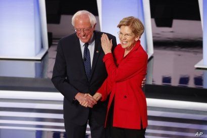 Sen. Bernie Sanders, I-Vt., and Sen. Elizabeth Warren, D-Mass., participate in the first of two Democratic presidential primary