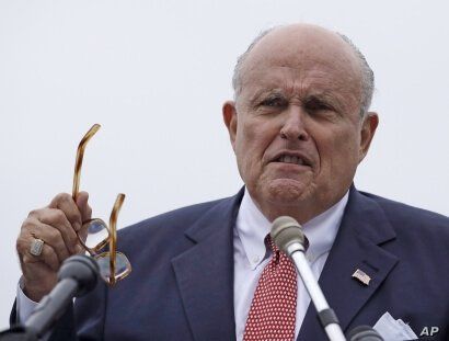 FILE - In this Aug. 1, 2018, file photo, Rudy Giuliani, an attorney for President Donald Trump, speaks in Portsmouth, N.H. On…