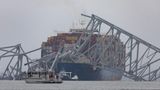 Crane arrives to remove toppled Francis Scott Key Bridge from river after being struck by ship