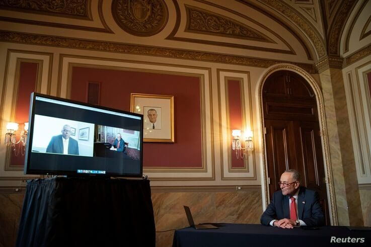 Senate Minority Leader Chuck Schumer (D-NY) speaks virtually with retired U.S. General Lloyd Austin, nominated by President…