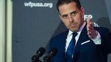 Artist spray paints 'DADDY' on the wall at Manhattan gallery that will host Hunter Biden's art