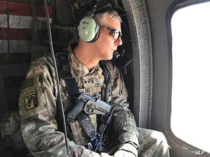 FILE - In this Feb. 8, 2017 file photo, U.S. Army Lt. Gen. Stephen Townsend watches during a tour north of Baghdad, Iraq. A…