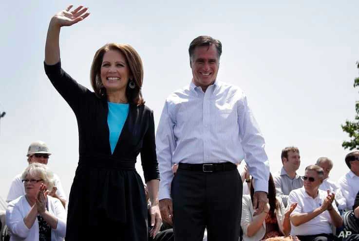 FILE - In this May 3, 2012, photo, Rep. Michele Bachmann of Minnesota joins Republican presidential candidate Mitt Romney at a campaign stop in Portsmouth, Virginia.