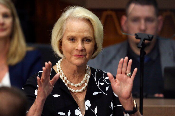 FILE - In this Jan. 13, 2020, file photo Cindy McCain, wife of former Arizona Sen. John McCain, waves to the crowd after being…