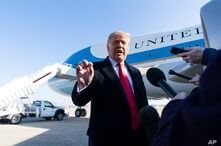 President Donald Trump speaks with reporters before boarding Air Force One Jan. 12, 2021, at Andrews Air Force Base, Maryland, to travel to Texas. 