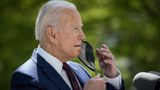 Biden urges vaccination, notes CDC guidance that fully vaccinated generally don't need mask outside