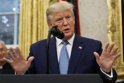 President Donald Trump speaks during a ceremony to present the Presidential Medal of Freedom to former Attorney General Edwin…