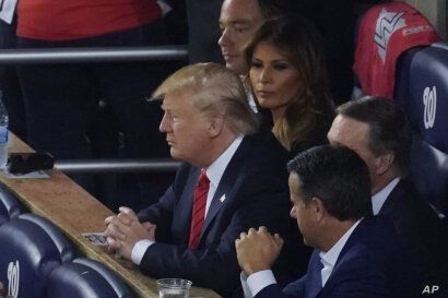 President Donald Trump watches during the second inning of Game 5 of the baseball World Series between the Houston Astros and the Washington Nationals, Oct. 27, 2019, in Washington.