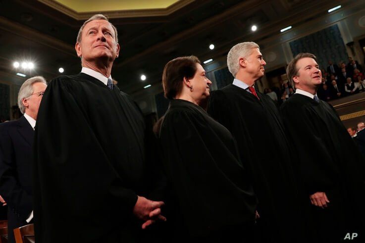 From left, Supreme Court Chief Justice John Roberts, Associate Justice Elena Kagan, Associate Justice Neil Gorsuch and…