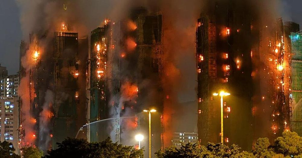 At least 13 dead in fire in Hong Kong high-rise apartment buildings