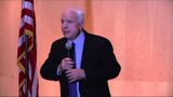 Fiesty town hall questions John McCain on Syria