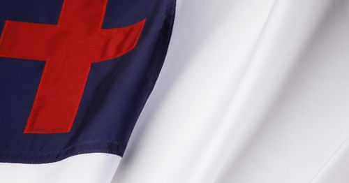 Supreme Court hears First Amendment case on Christian flag