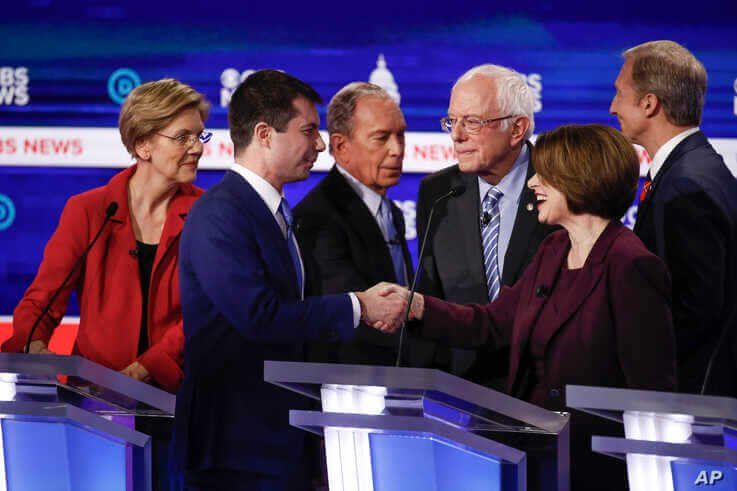 From left, Democratic presidential candidates, Sen. Elizabeth Warren, D-Mass., former South Bend Mayor Pete Buttigieg, former…