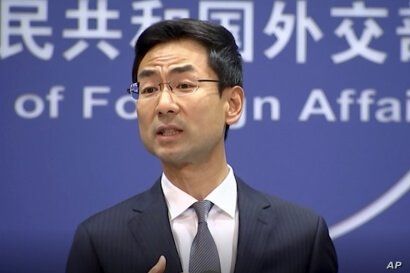 In a still image from video, Chinese Foreign Ministry spokesman Geng Shuang speaks during a media briefing in which he commented on investigations into Chinese-Australian writer Yang Hengjun in Beijing, July 17, 2019.