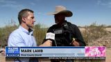 Eric Greitens talks with Pinal County Sheriff Mark Lamb at the border