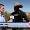 Eric Greitens talks with Pinal County Sheriff Mark Lamb at the border