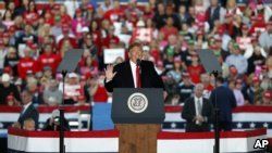 FILE - President Donald Trump speaks during a rally at Southern Illinois Airport in Murphysboro, Ill., Oct. 27, 2018.