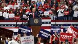 Hillary Clinton compares Trump supporters to Nazis after some lifted their hands in the air at rally