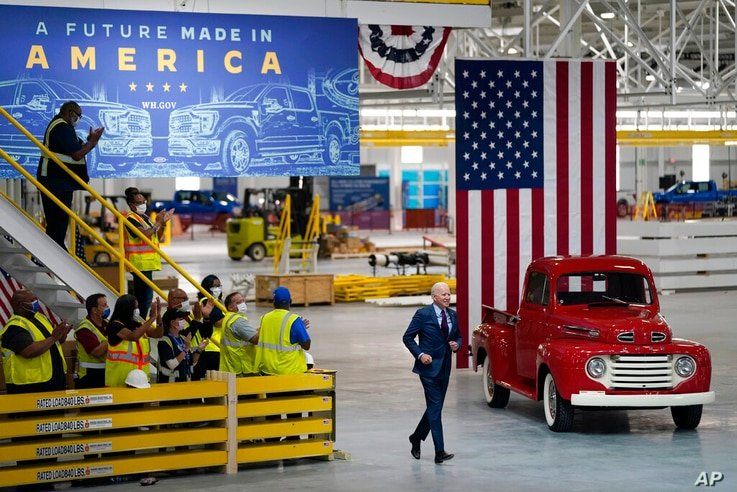 President Joe Biden arrives to speak after a tour of the Ford Rouge EV Center, Tuesday, May 18, 2021, in Dearborn, Mich. (AP…