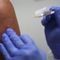 Amid vaccine rollout, some Catholics struggle with shots' connections to abortion