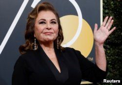 Actress Roseanne Barr waves on her arrival to the 75th Golden Globe Awards in Beverly Hills, California, Jan. 7, 2018.