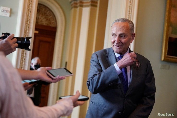 Senate Majority Leader Chuck Schumer (D-NY) speaks to reporters about the bipartisan infrastructure bill at the U.S. Capitol in…